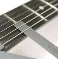 measure action with feeler gage